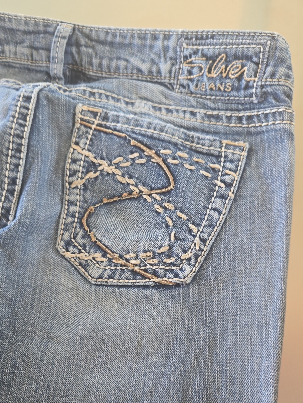 Silver Jeans Light Blue Bootcut Jeans with Embroidered Pocket